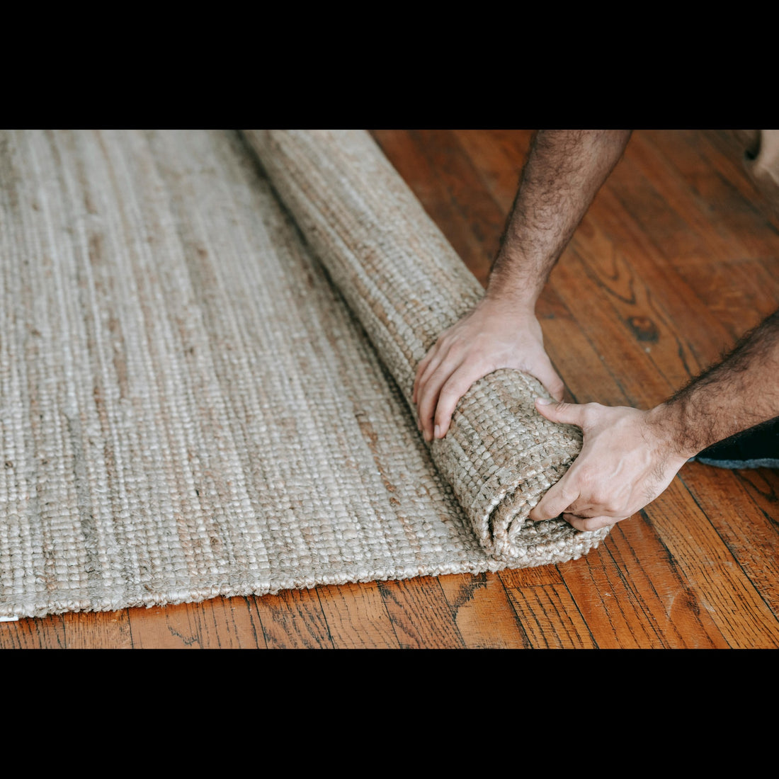 rug is being rolled