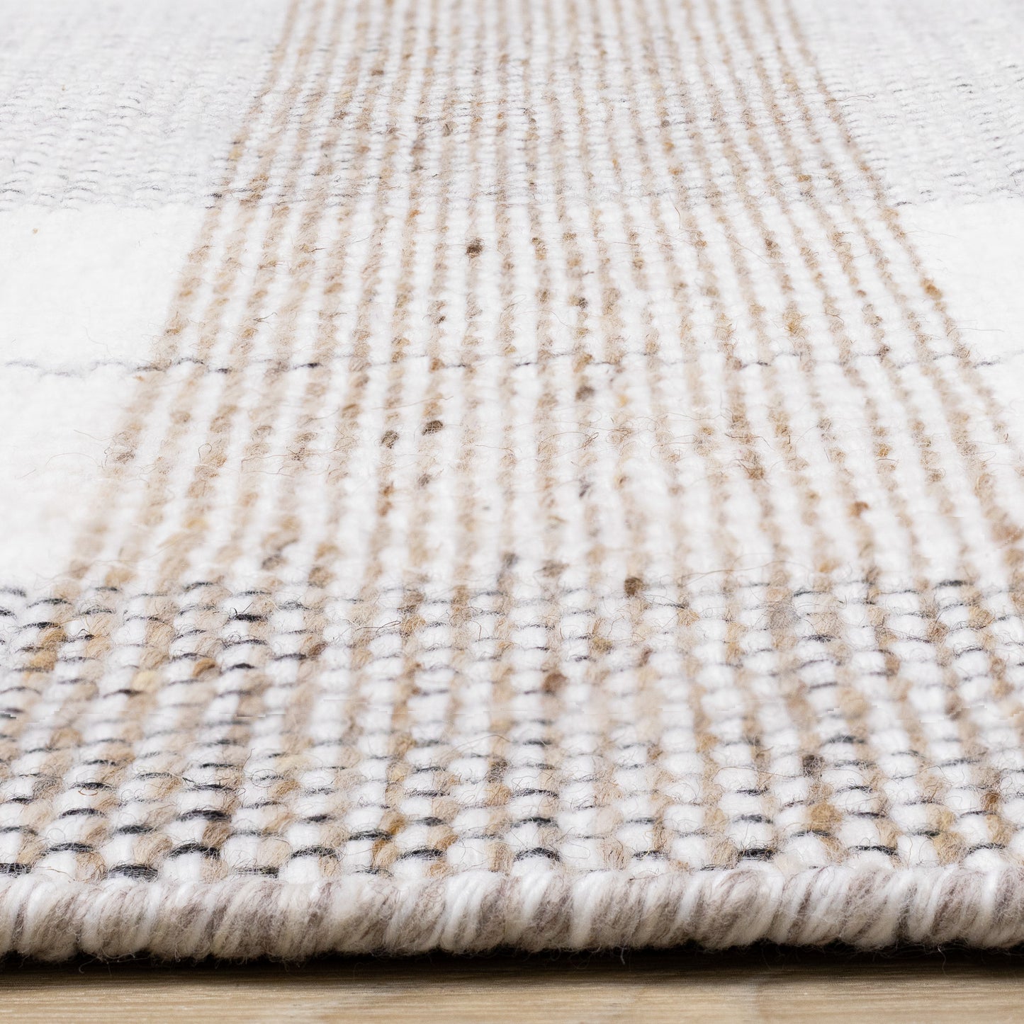Tapis contemporain à carreaux géométriques crème