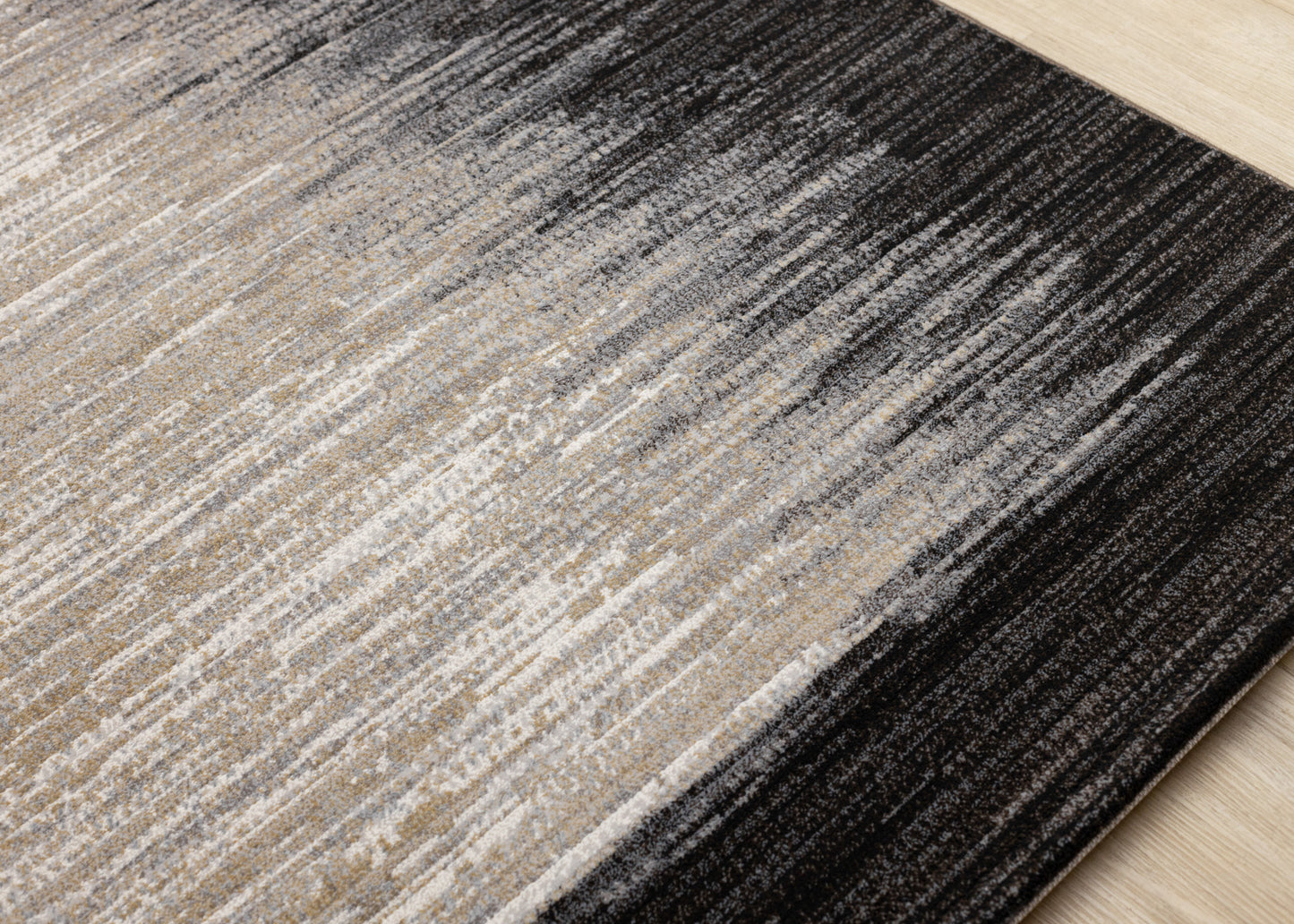 Alfombra contemporánea negra con borde desgastado