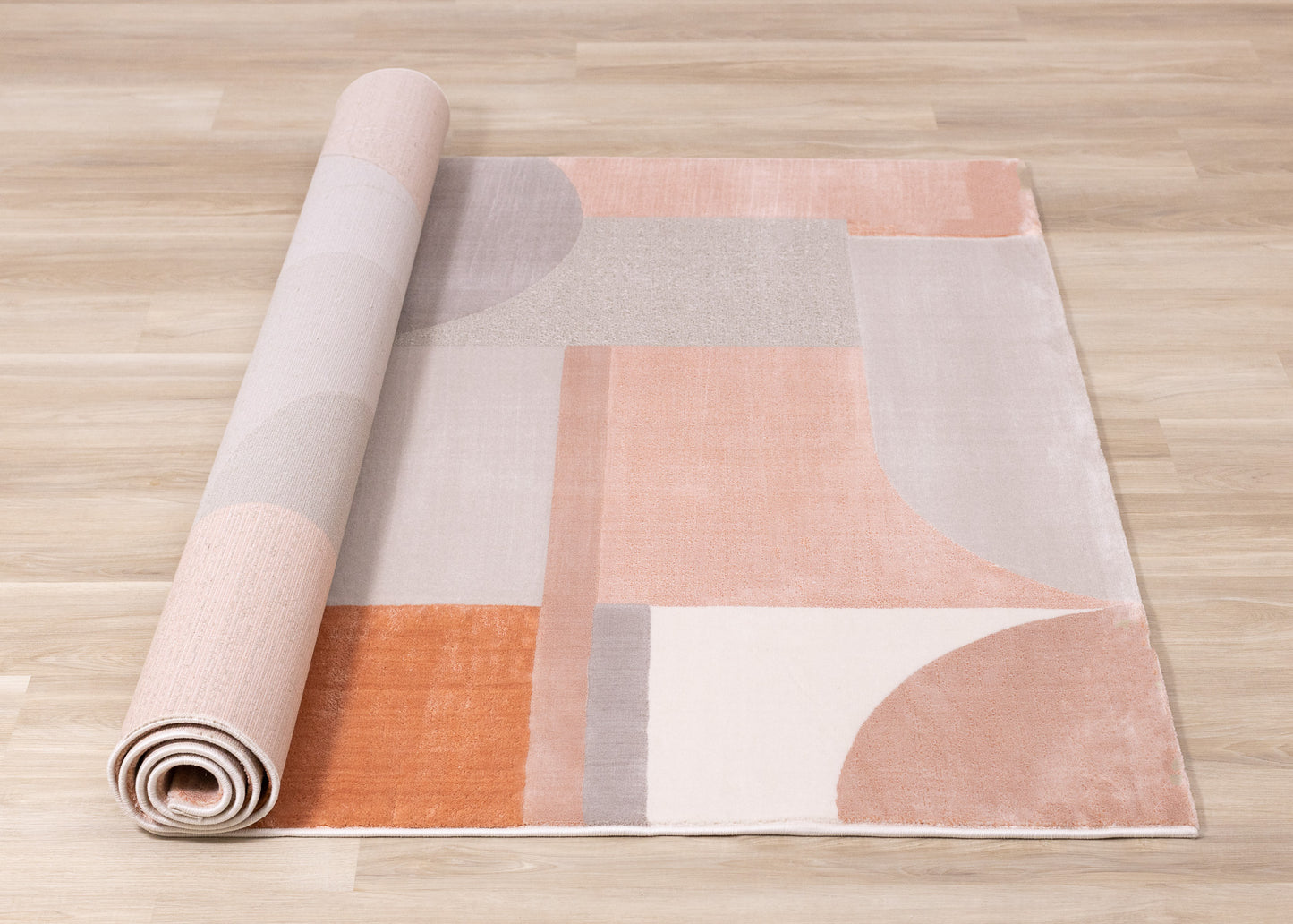 Alfombra geométrica moderna de color rosa