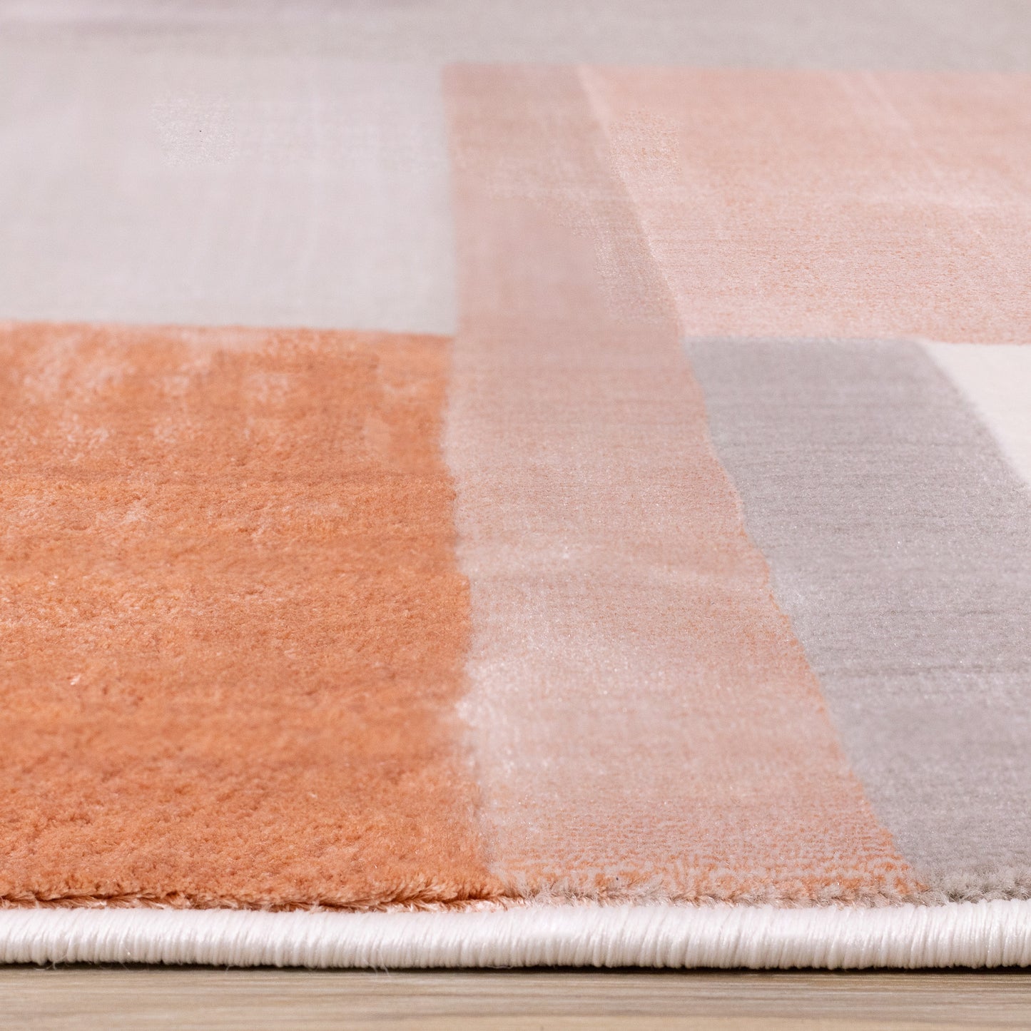 Tapis géométrique moderne rose