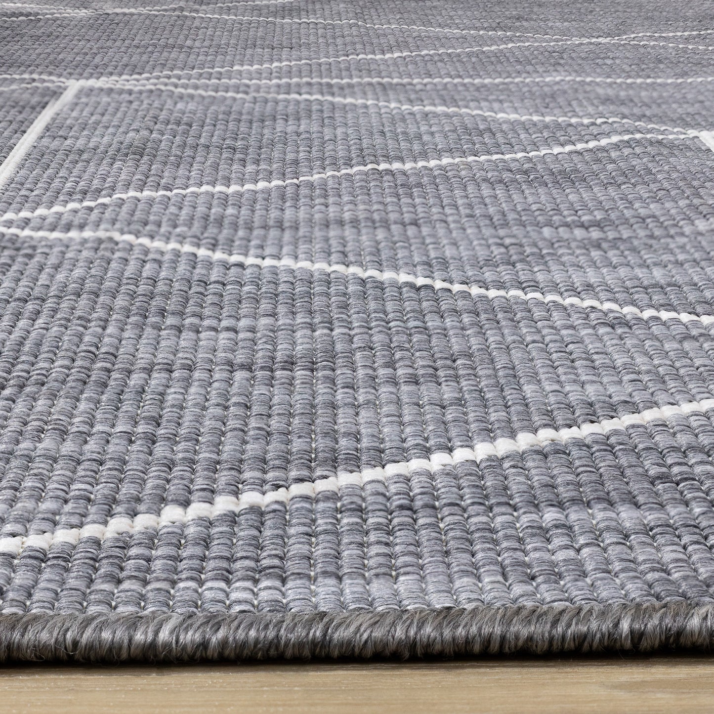 Alfombra geométrica contemporánea gris