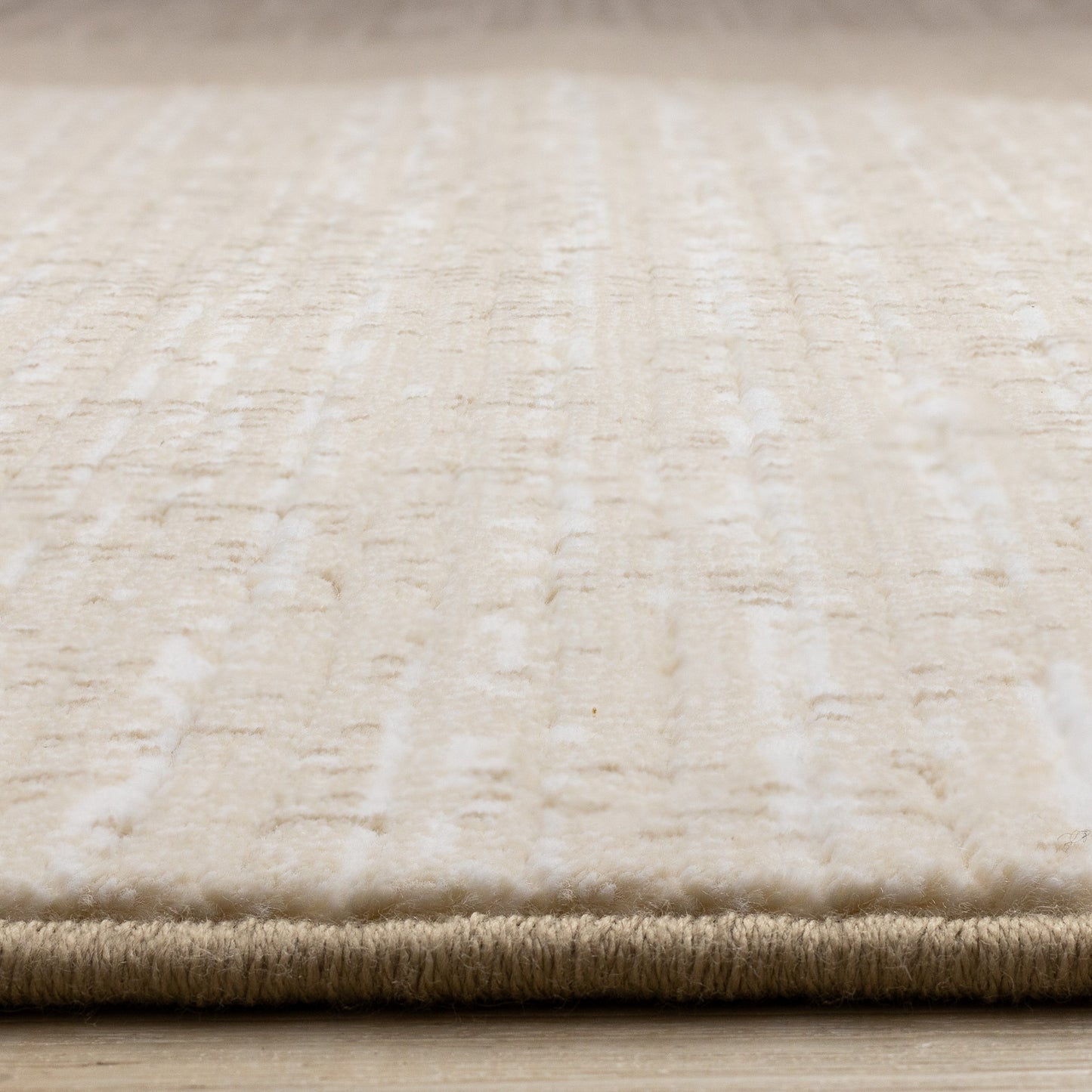 Tapis d'art beige vieilli