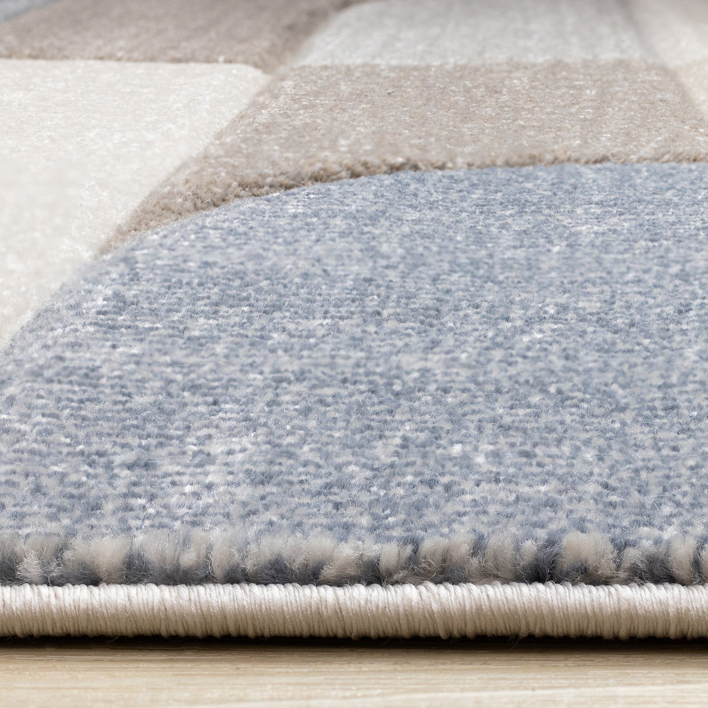 Tapis géométrique bleu artistique