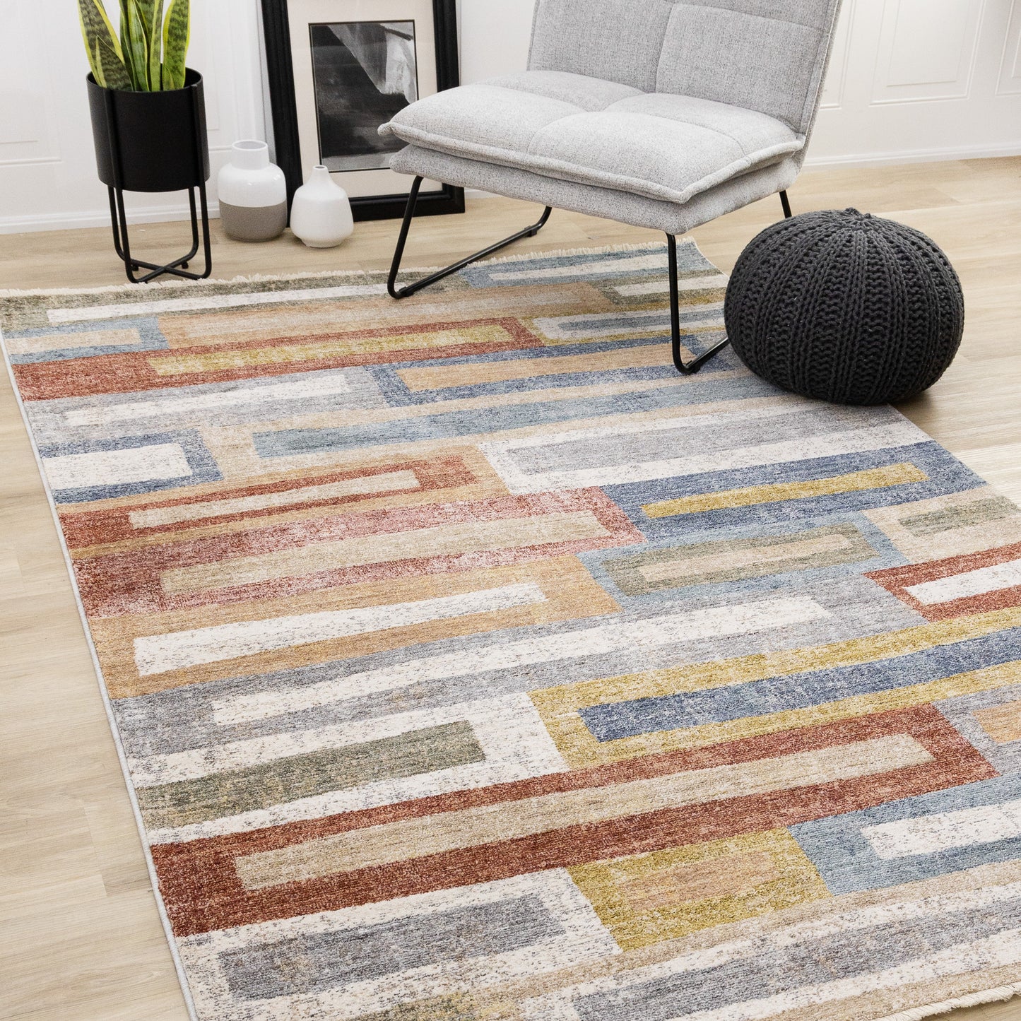 Alfombra contemporánea con diseño geométrico envejecido en color naranja