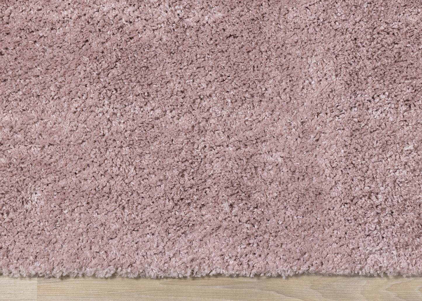 Alfombra moderna de color rosa sólido