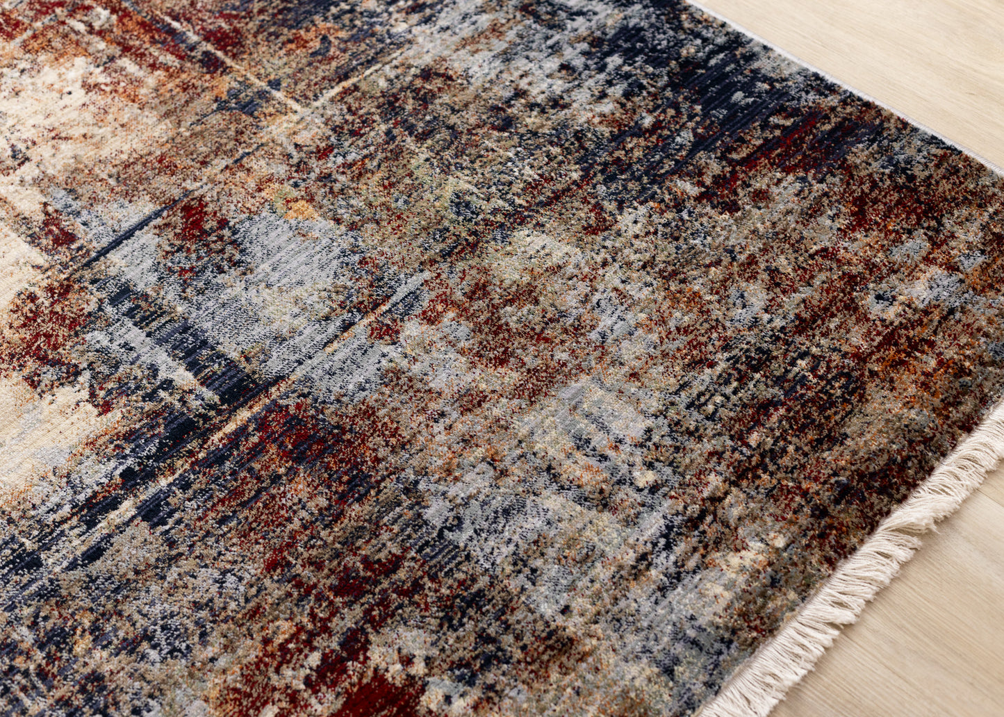 Alfombra contemporánea de color crema desgastada