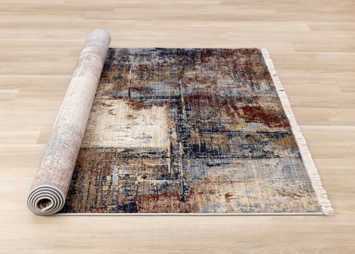 Alfombra contemporánea de color crema desgastada