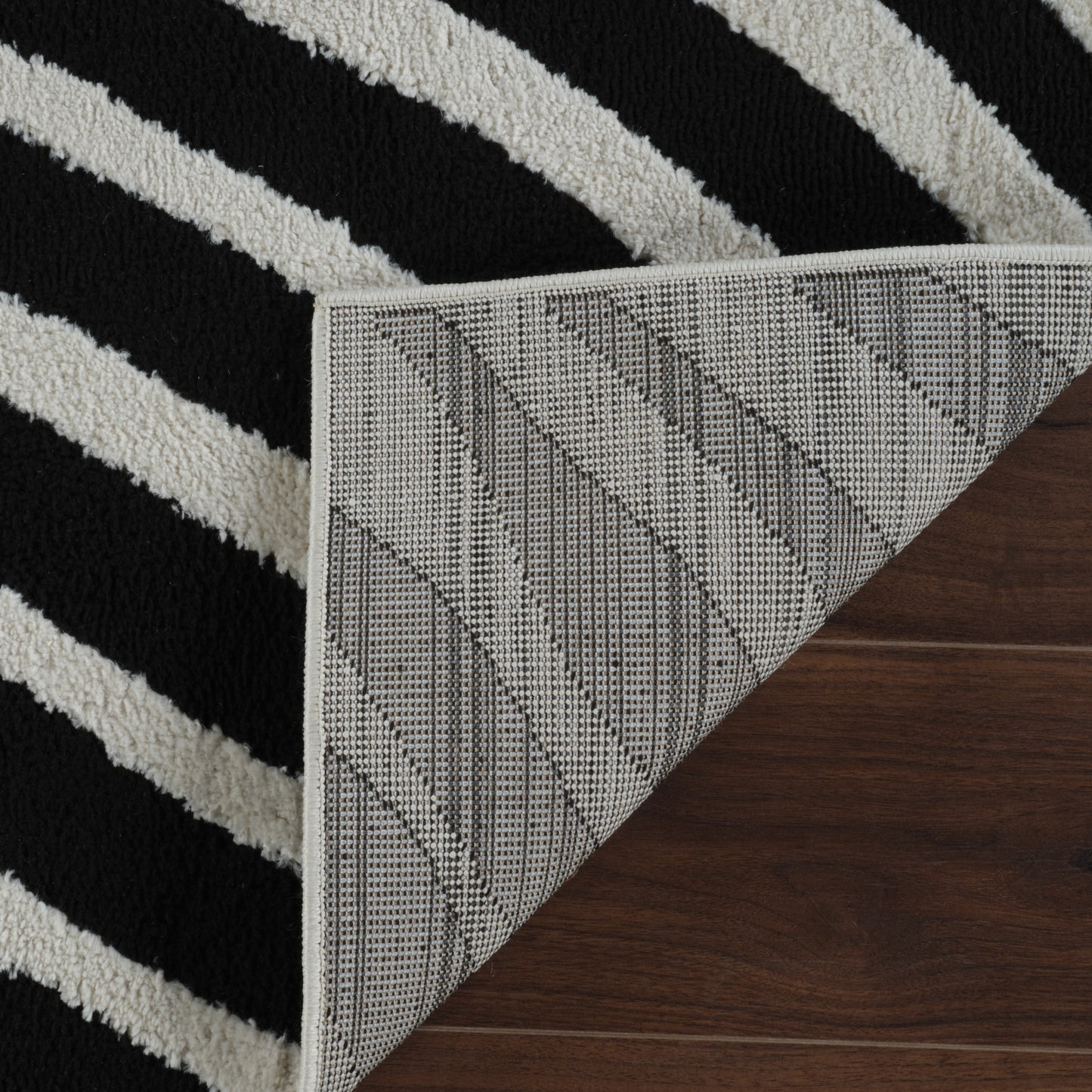 Alfombra Domus con estampado de cebra moderna en blanco y negro