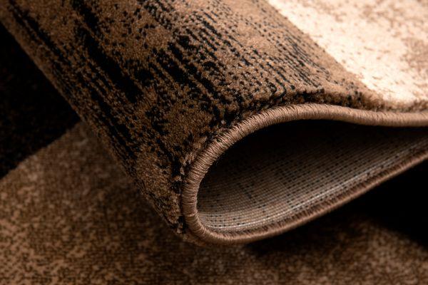 Tapis marron à carreaux géométriques Montage