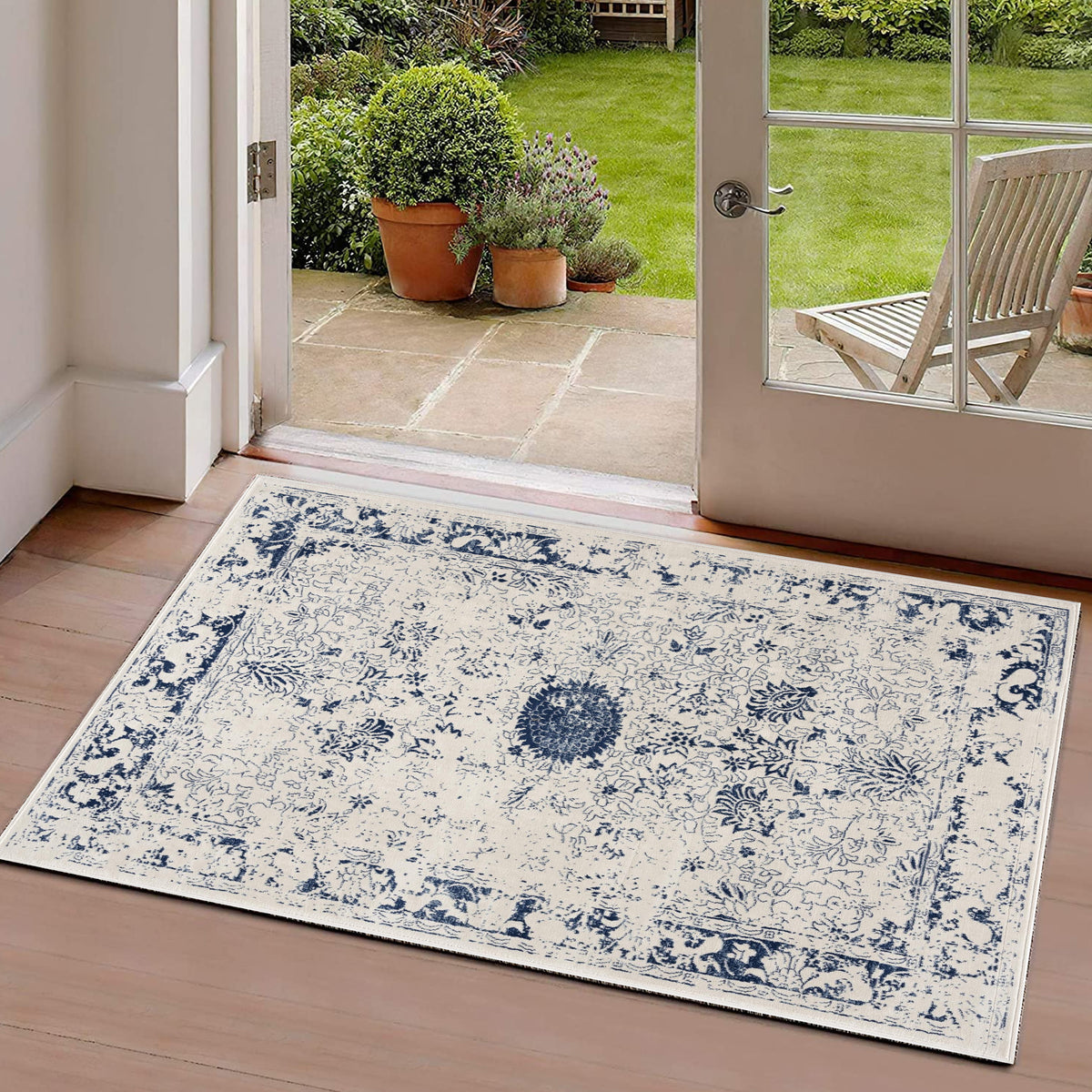 Naveen Floral Medallion Contemporary Navy Blue and Cream Indoor Rug