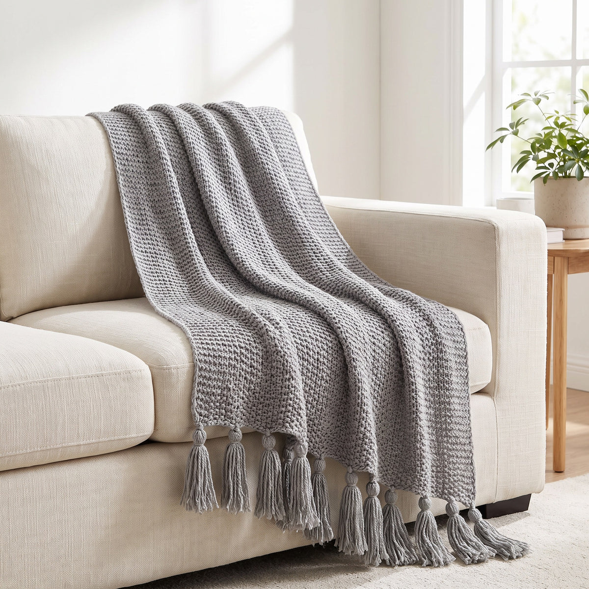 Alden Acrylic Grey Throw in a room