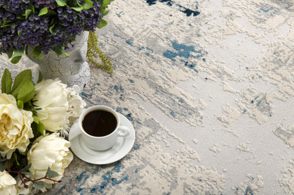 Tapis bleu contemporain abstrait Vogue