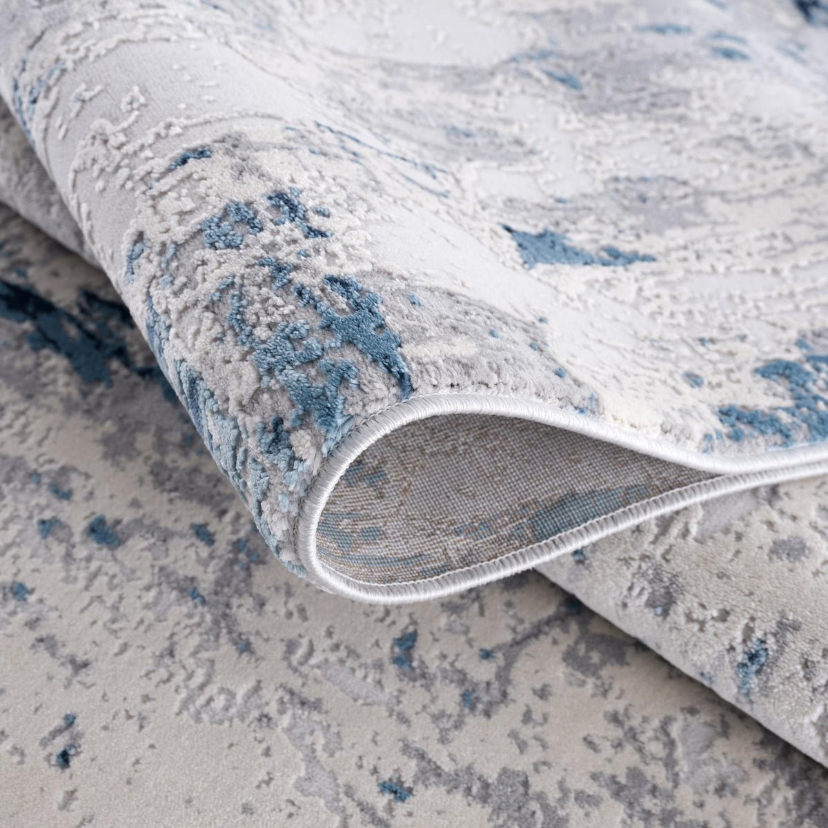 Amara Abstract Contemporary Blue and Cream Indoor Rug