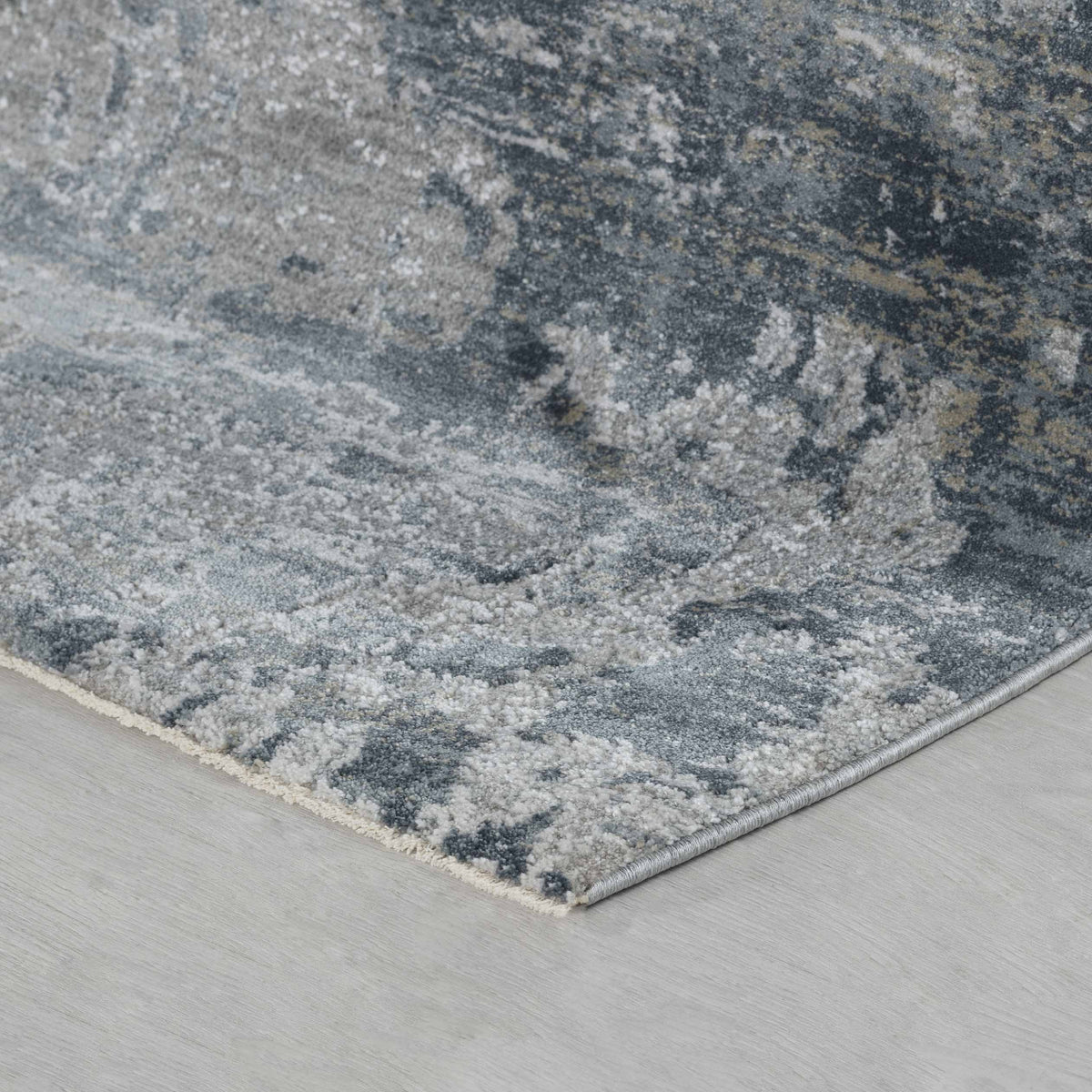 Tapis Eira abstrait contemporain bleu et gris
