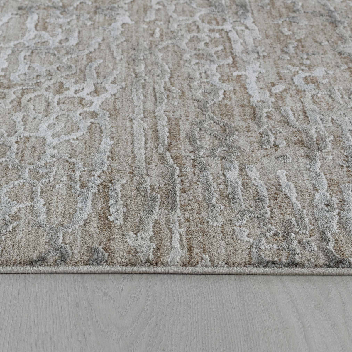 Tapis Elio abstrait vieilli contemporain beige et marron