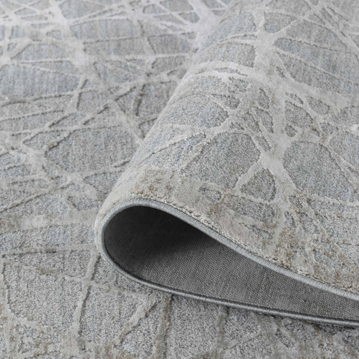 Tapis Vetra abstrait à motif toile contemporain bleu et beige