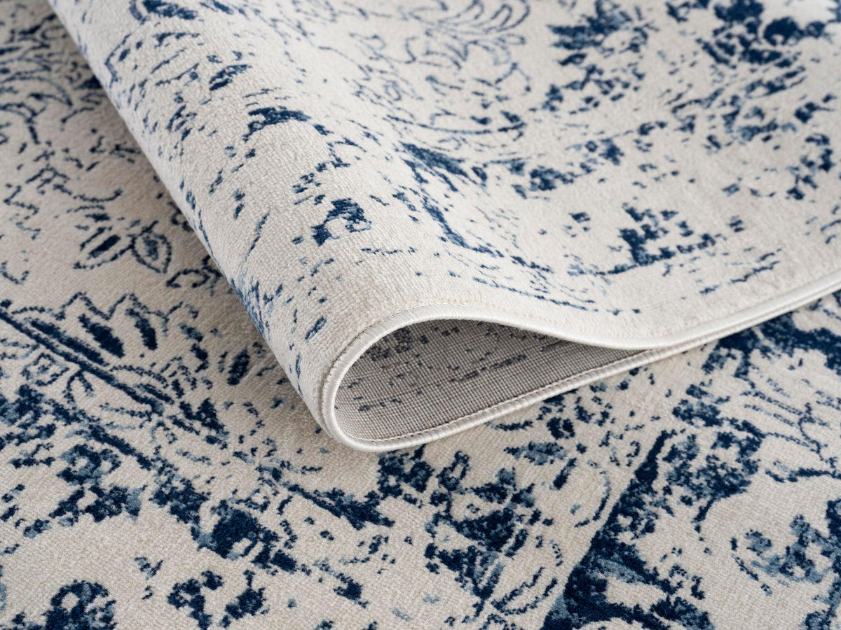 Naveen Floral Medallion Contemporary Navy Blue and Cream Indoor Rug