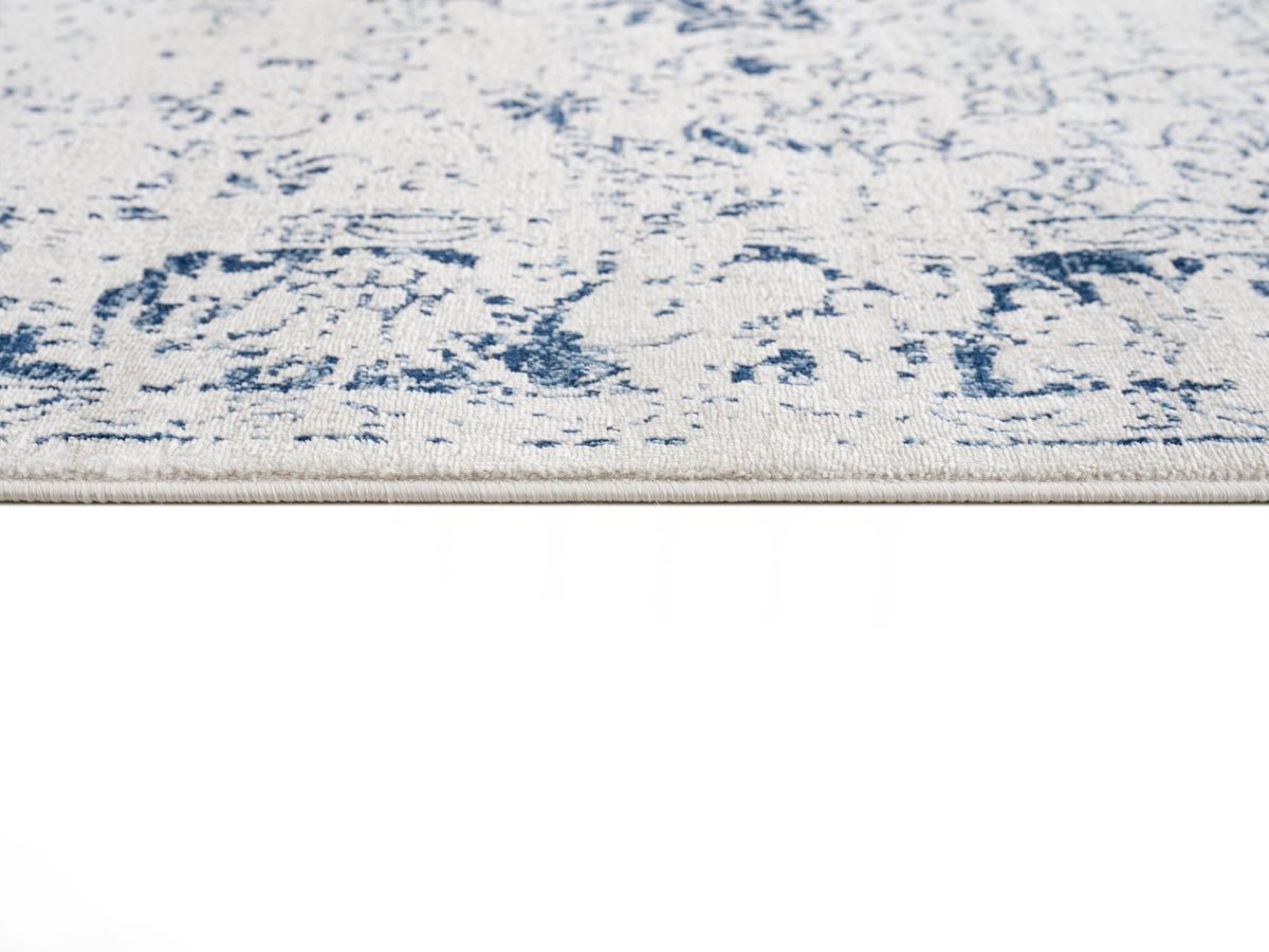 Naveen Floral Medallion Contemporary Navy Blue and Cream Indoor Rug
