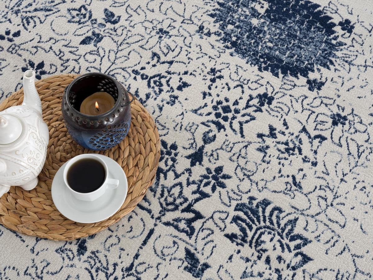 Naveen Floral Medallion Contemporary Navy Blue and Cream Indoor Rug
