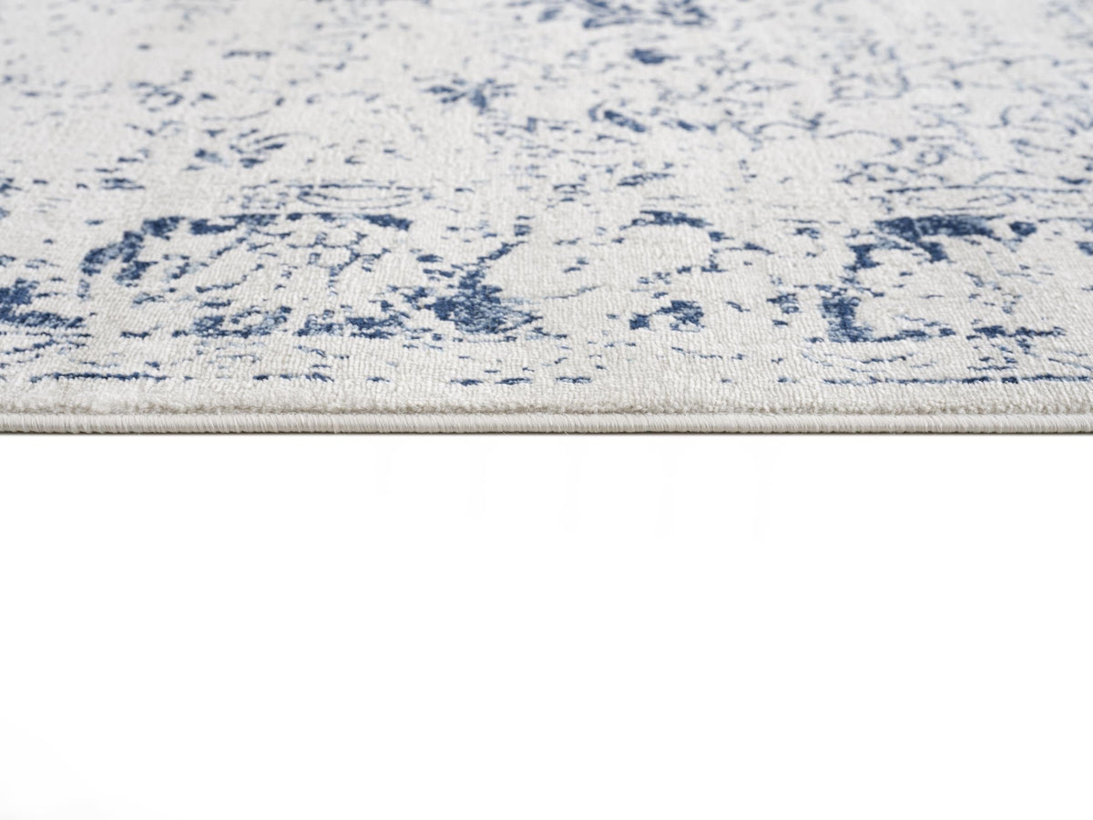 Naveen Floral Medallion Contemporary Navy Blue and Cream Indoor Rug