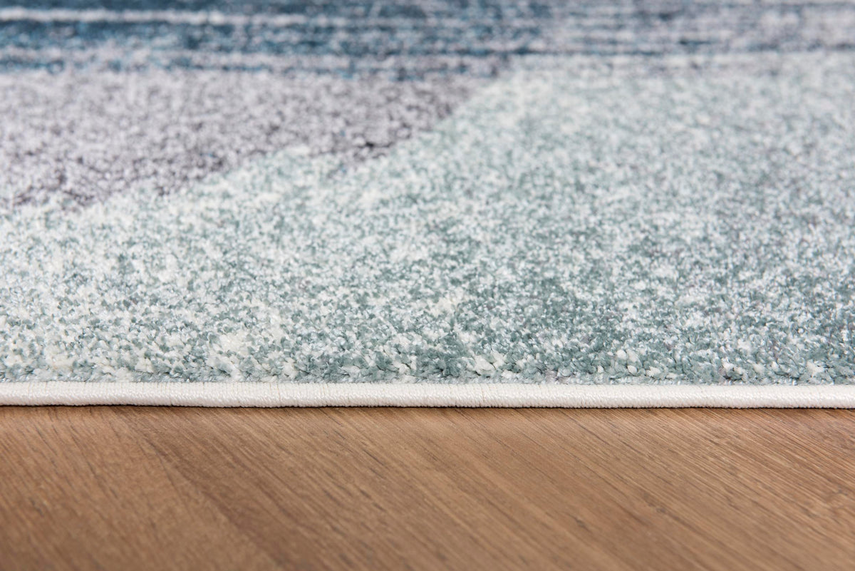 Tapis Rivah abstrait contemporain bleu et blanc