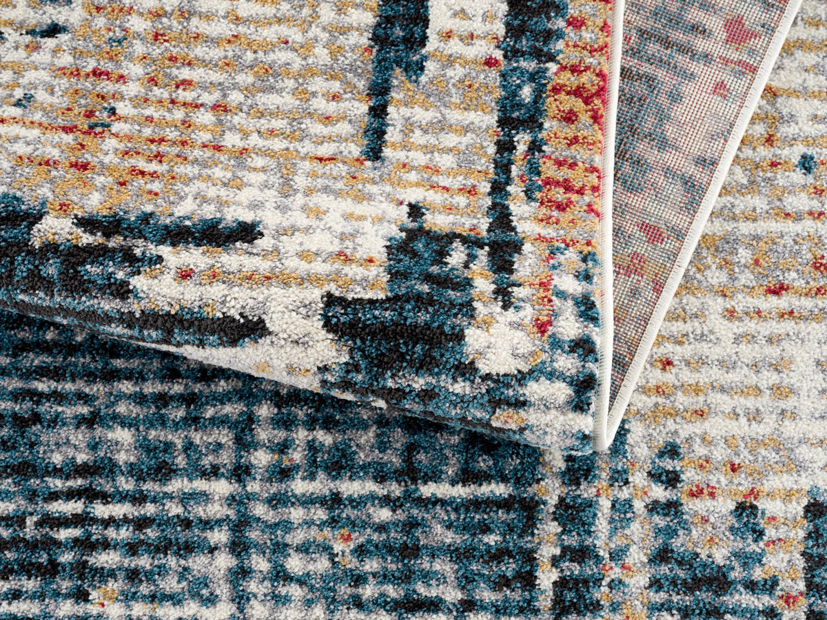 Alfombra de interior contemporánea Mehr, azul y rojo abstracto