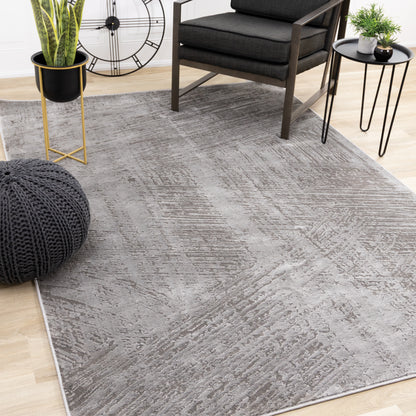 Tapis gris moderne à l'aspect vieilli