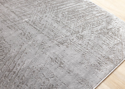 Tapis gris moderne à l'aspect vieilli