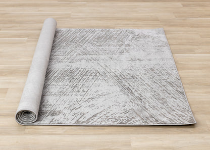 Tapis gris moderne à l'aspect vieilli