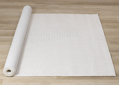 Alfombra geométrica moderna en tonos crema sólidos