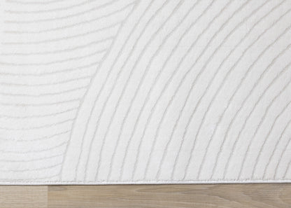 Alfombra geométrica moderna en tonos crema sólidos