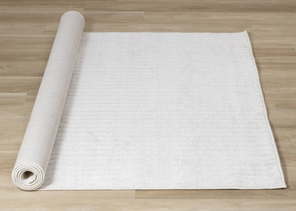 Alfombra moderna de rayas en tonos crema sólidos