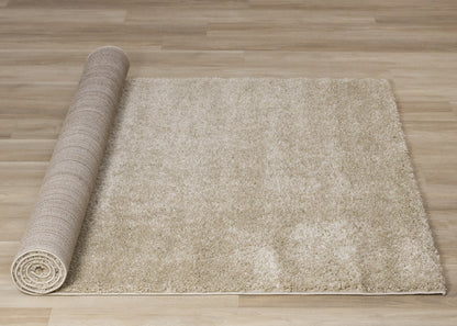 Alfombra moderna en tonos beige lisos