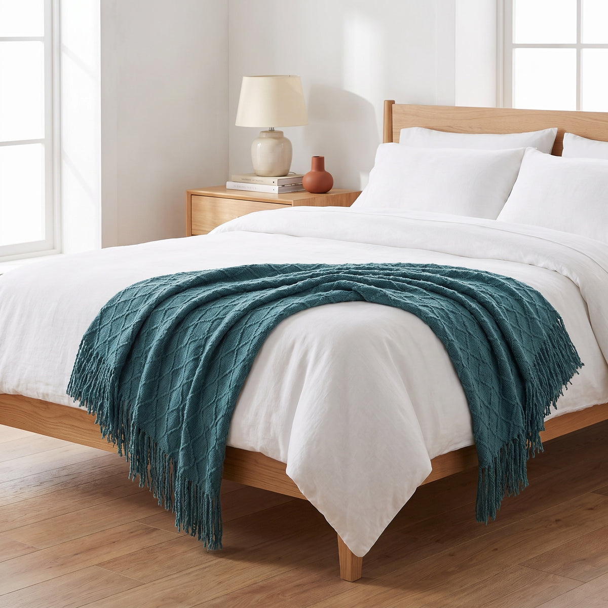 Alden Acrylic Teal Throw in a room