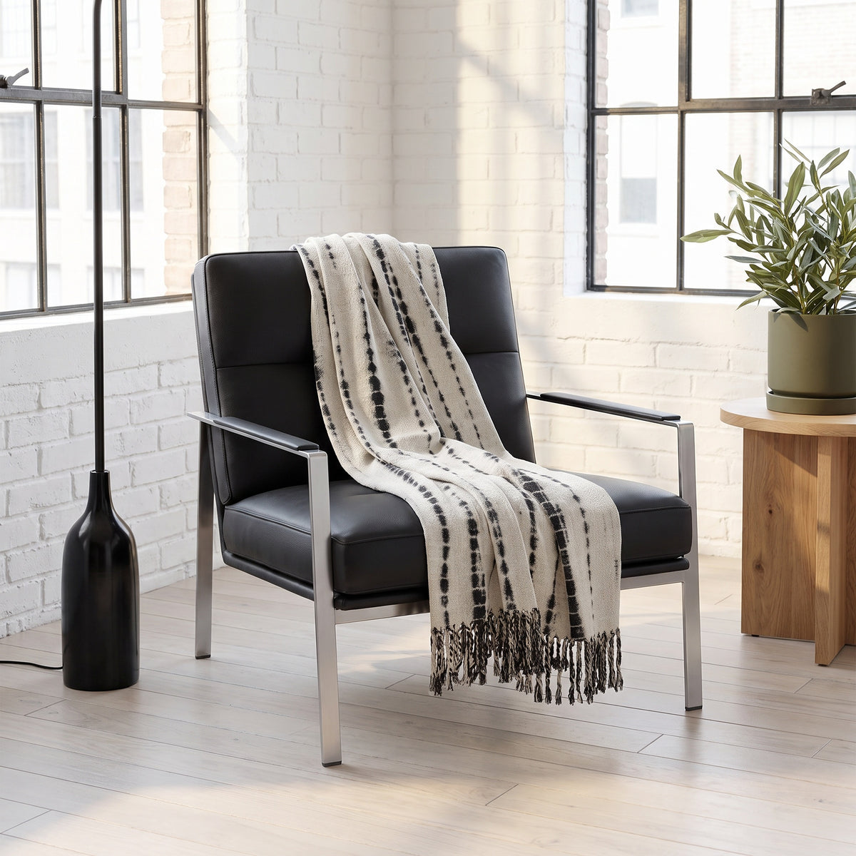 Sova Cotton Black and White Striped Throw in a room