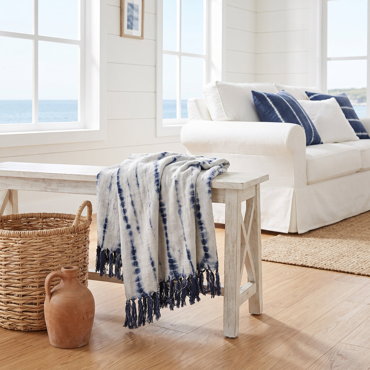 Sova Cotton Blue and White Throw in a room