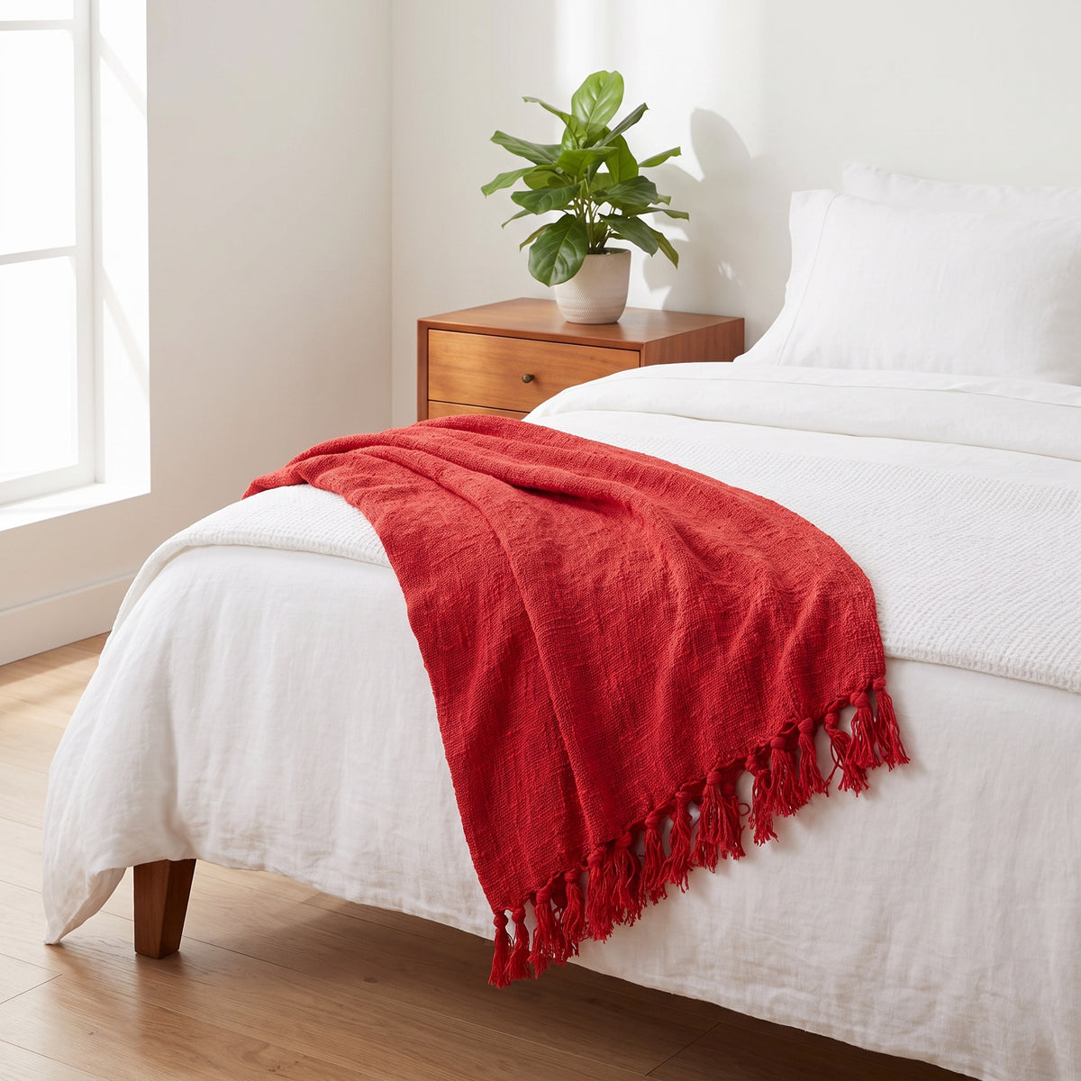 Sova Cotton Red Throw in a room