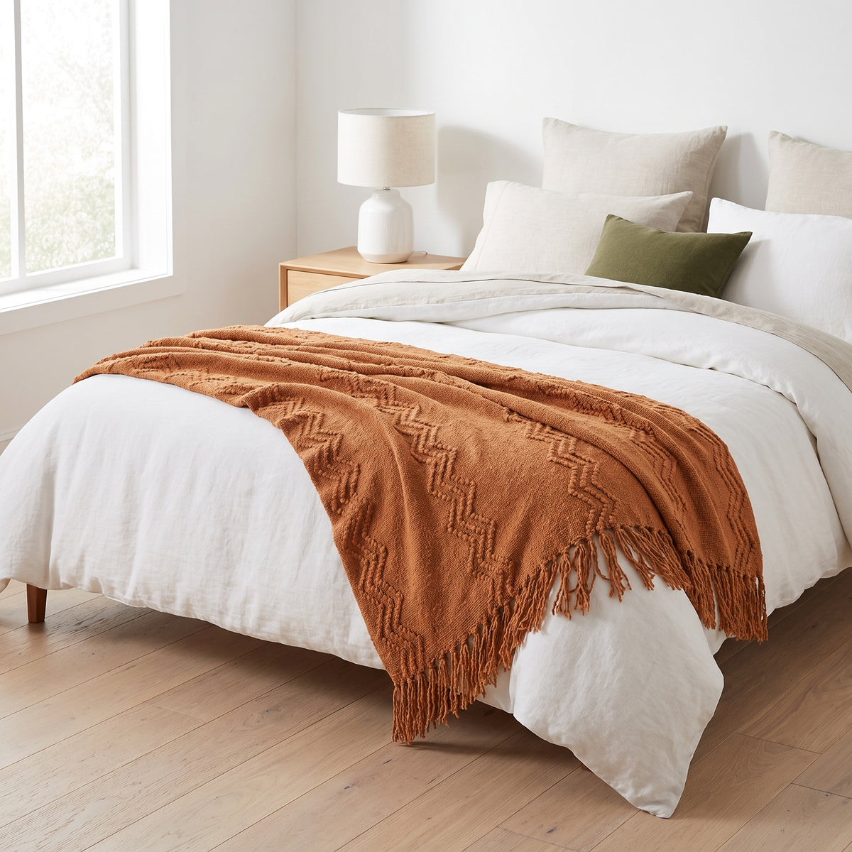 Alden Acrylic Terracotta Throw in a room