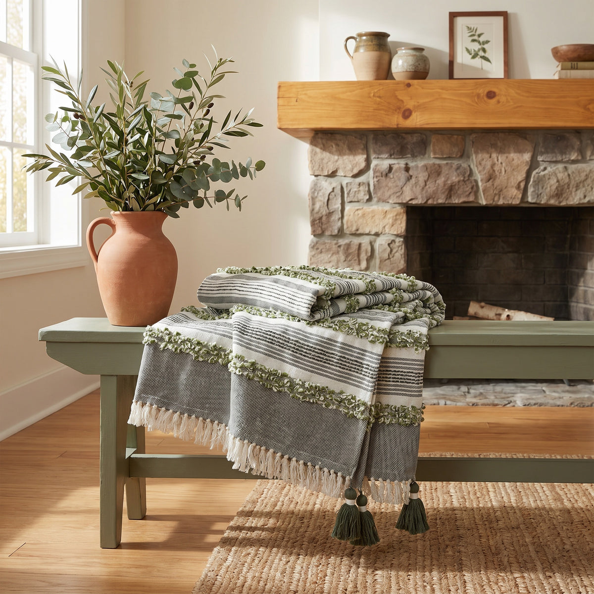 Sova Cotton Grey and Green Throw in a room