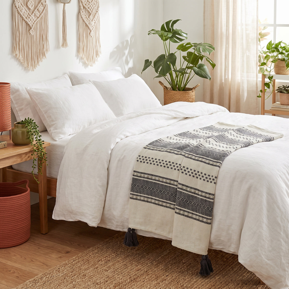 Sova Cotton Ivory and Grey Throw in a room