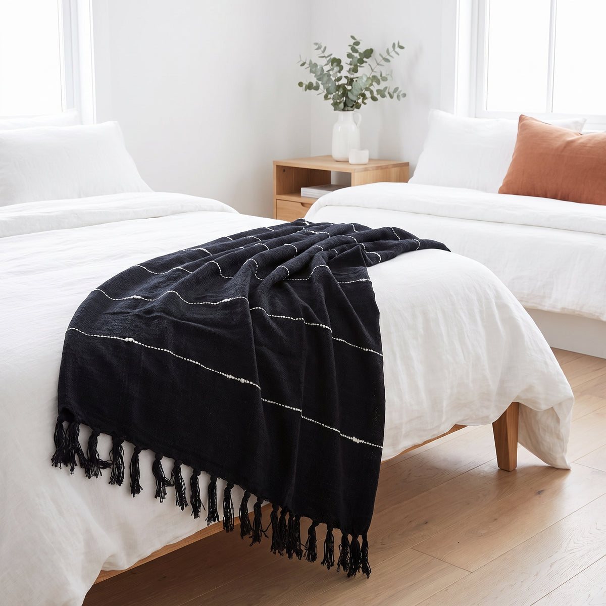 Sova Cotton Black & White Throw in a room