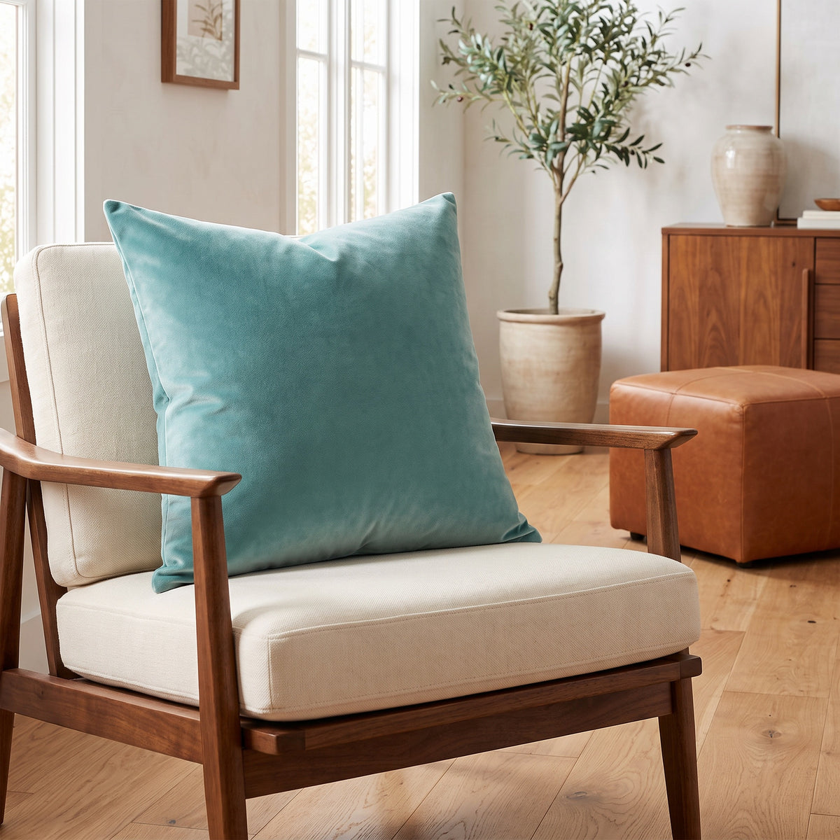 Lumo Velvet Aqua Pillow in a room