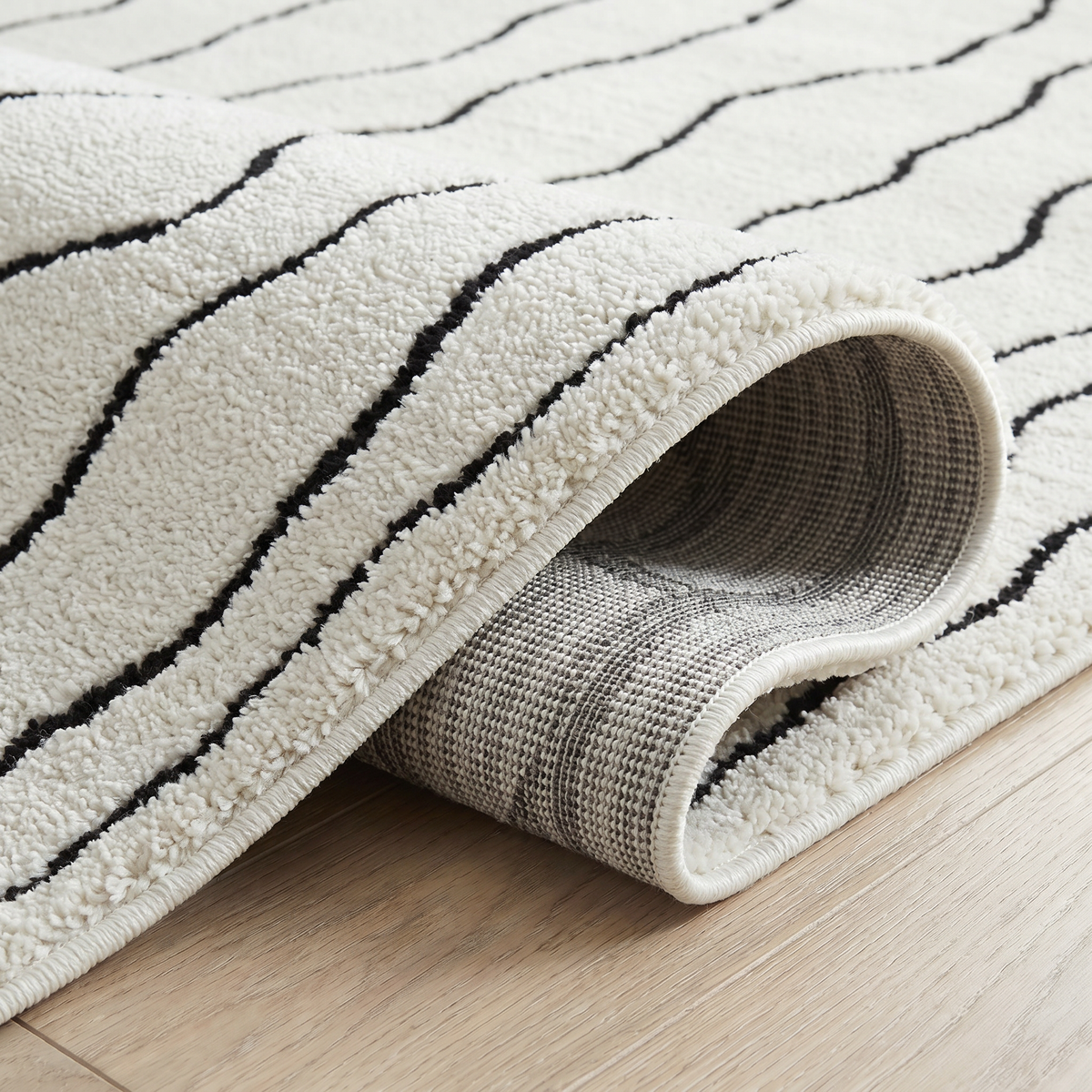 Aida Abstract Modern Cream and Black Indoor Rug
