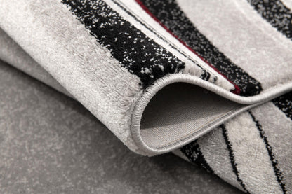 Alfombra gris con líneas abstractas de montaje