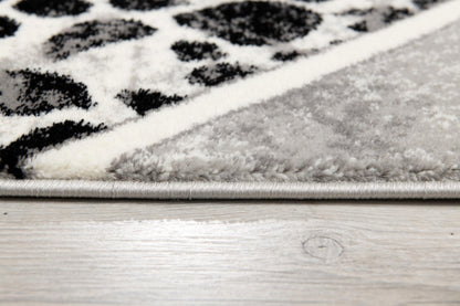 Tapis gris à imprimé animal géométrique Montage