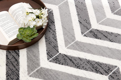 Alfombra gris con ondas geométricas Montage