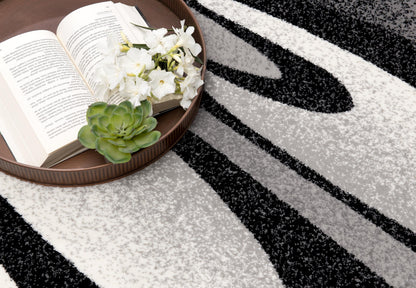 Alfombra negra bohemia abstracta de montaje