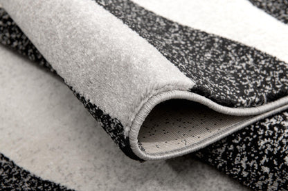 Alfombra negra bohemia abstracta de montaje