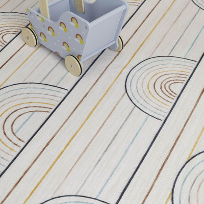 Tapis de jeu arc-en-ciel coloré rayé Soft Steps Playtime, tapis doux bleu